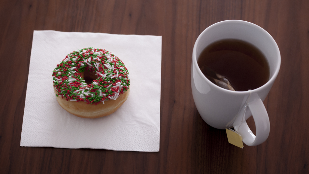 The shapes of a donut and a mug are similar. Both have a single hole. If you made these shapes from clay, you could mold one into the other without breaking or tearing the clay. Under certain rules, these shapes could represent members of one topological family. Steven Errico/Getty Images
