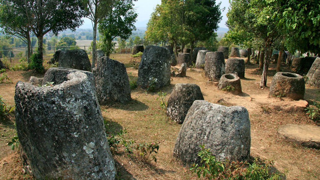 The Plain of Jars in Laos is a collection of thousands of large, ancient stone vessels. Local legend says they stored rice wine for giants. Some thought they may might once have stored food and water. Now researchers say they’re part of a vast burial complex. iannomadav/iStock/Getty Images Plus