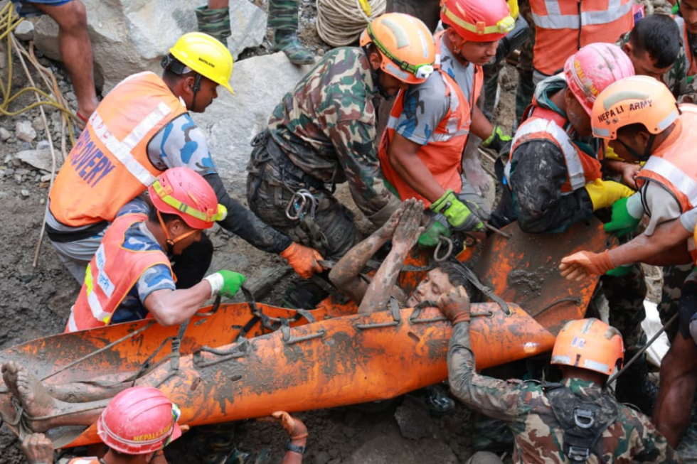 Rescuers in Nepal have pulled two workers alive from an underground tunnel at a hydropower plant. That is raising hopes of reaching dozens of others believed to be trapped there nine days after deadly